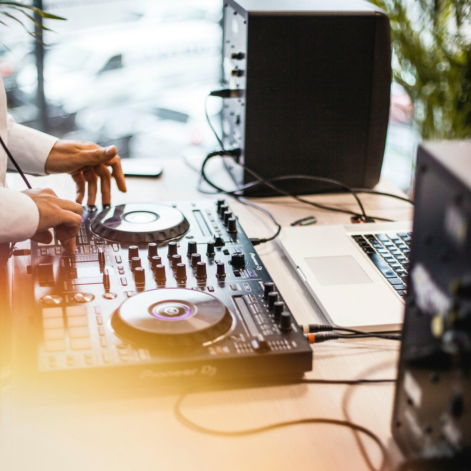 dj in a cafe with speakers